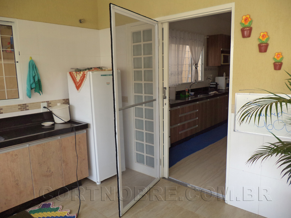 Porta em tela mosquiteira